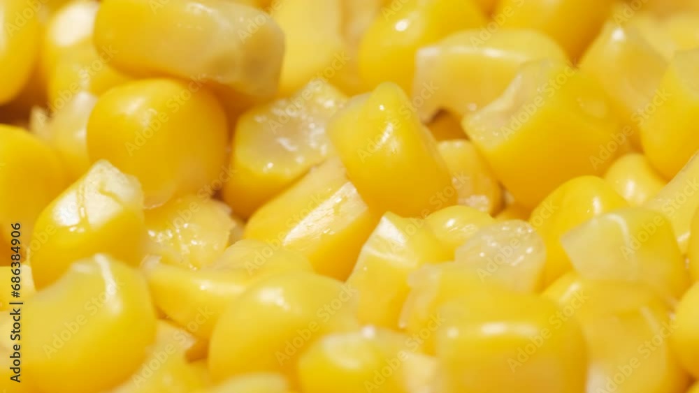 Corn seeds rotate in a circle, macro video Corn seeds rotate in a circle, macro video