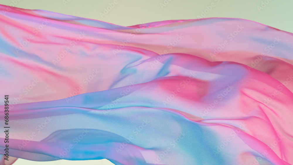 Pastel color transparent silk fabric flowing by wind,
