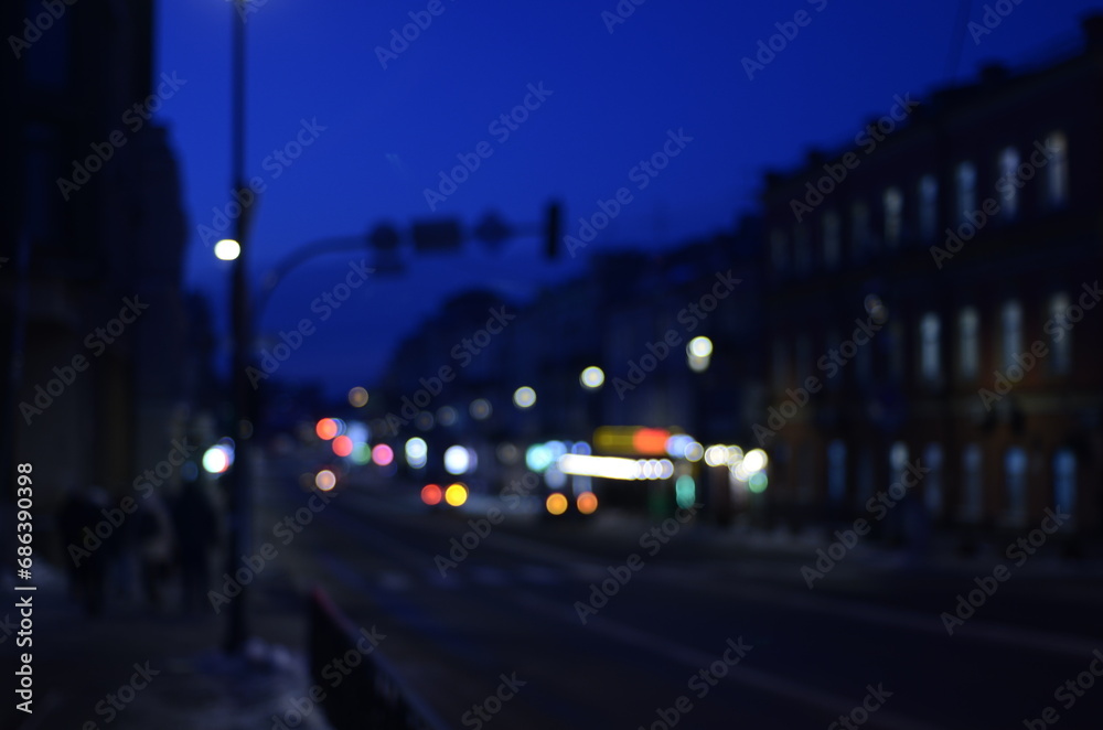 Blurred view of night city street