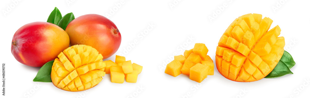Mango fruit half with leaves and slices isolated on white background close-up Mango fruit half with leaves and slices isolated on white background close-up