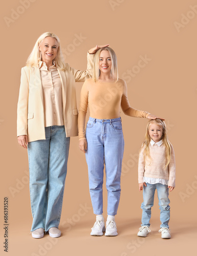 Cute little girl with her m...