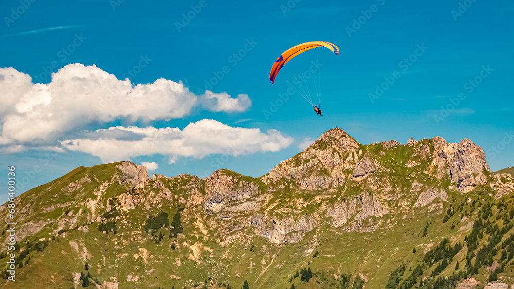 Alpine summer view with paragliders at Mount Fulseck, Dorfgastein, St. Johann im Pongau, Salzburg, Austria Alpine summer view with paragliders at Mount Fulseck, Dorfgastein, St. Johann im Pongau, Salzburg, Austria