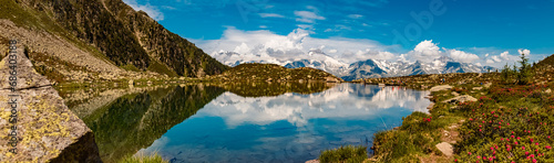 Fototapeta Naklejka Na Ścianę i Meble -  High resolution stitched alpine summer panorama with reflections at Lake Klaussee, Mount Klausberg, Ahrntal valley, Pustertal, Trentino, Bozen, South Tyrol