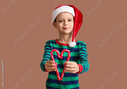 Cute little boy in Santa ha...