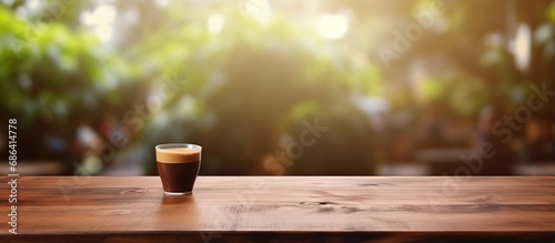 Mock up wooden table in coffee shop for product display or montage