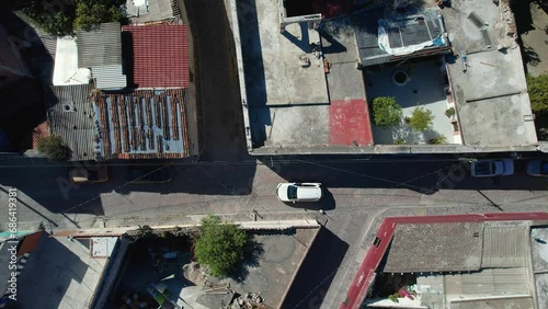Aerial view of a car driving through the streets of Mexico