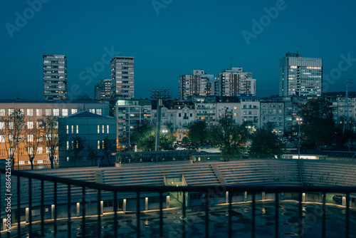 Blue hour view of distant buildings from Tasmajdan Park  Belgrade  Serbia