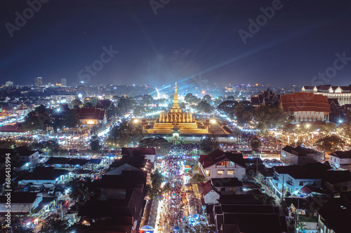 Phra That Luang Festival, Drone Shot Hight angle Vientiane at night candlelight, Lao PDR