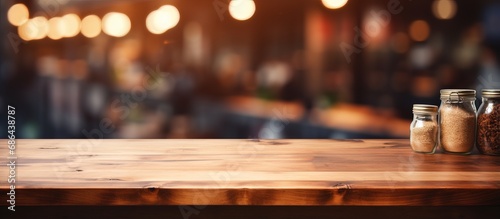 Blurry background of a modern restaurant room or coffee shop with an empty table for product display mockup