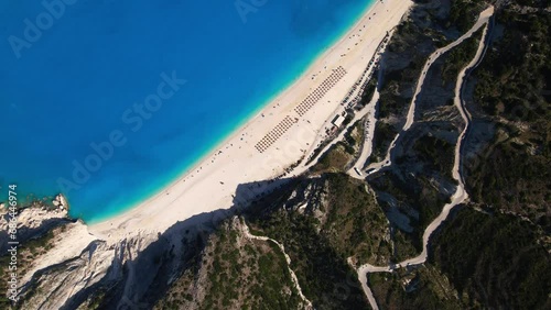 Flying over Myrtos beach, Kefalonia, during the summer, Greek Ionian Islands. photo