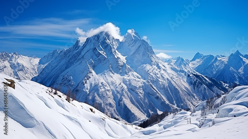 snowy greater caucasus ridge with the Mt. Ushba at winter