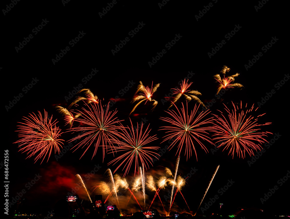 Fireworks show under defocus or blur concepts with isolated black background at night, this celebration is for the International Fireworks Festival in Pattaya on Nov 24-25 in Thailand Fireworks show under defocus or blur concepts with isolated black background at night, this celebration is for the International Fireworks Festival in Pattaya on Nov 24-25 in Thailand