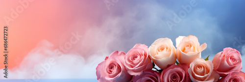Elegant Pastel-Toned Roses Bouquet Against a Blue and Pink Gradient Background