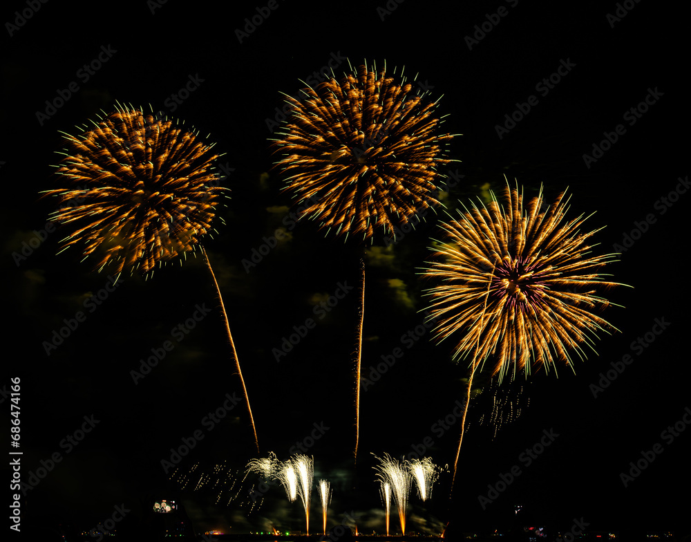 Fireworks show under defocus or blur concepts with isolated black background at night, this celebration is for the International Fireworks Festival in Pattaya on Nov 24-25 in Thailand Fireworks show under defocus or blur concepts with isolated black background at night, this celebration is for the International Fireworks Festival in Pattaya on Nov 24-25 in Thailand