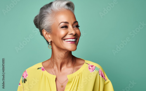 old happy smiling Beautician on solid color background