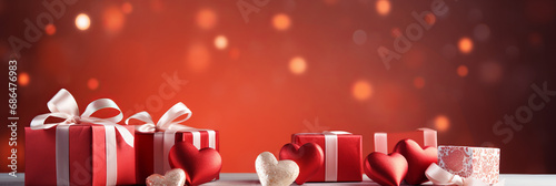 Valentine's Day Red Gift Boxes and Hearts on a Reddish Backdrop