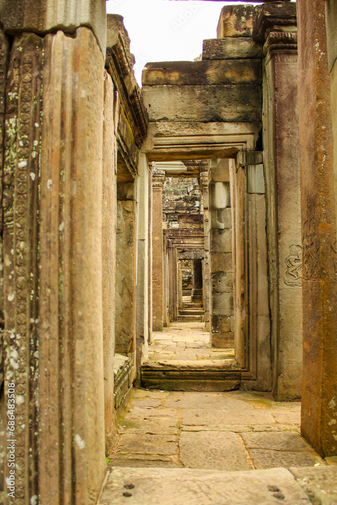The passage through Bayon temple in Angkor Thom, Siemreap, Cambodia. The passage through Bayon temple in Angkor Thom, Siemreap, Cambodia.