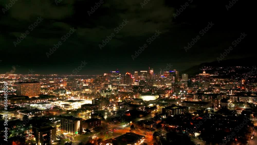 Wide angle drone view panning to the left of downtown Salt Lake City at night Wide angle drone view panning to the left of downtown Salt Lake City at night
