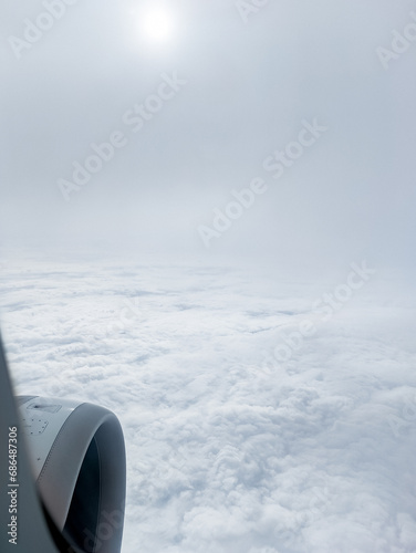 Clouds background scenic sky nature view from an airplane window during flight. Travel concept  Flight  Journey  Adventure  Explore  Destination Tourism  Vacation  Trip  Wanderlust  Aerial View