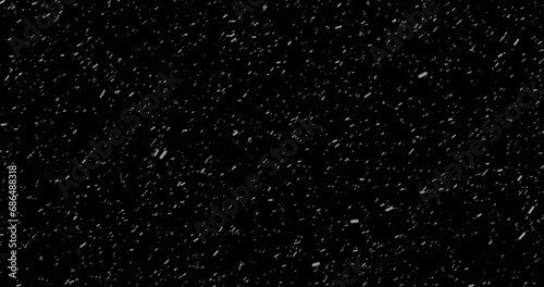 Cinematic snowfall loop animation of a surreal realistic snowflake falling bg. Snowfall winter overlay slowly falls on a black backdrop. Snowflake for Christmas new year 2024 2025.