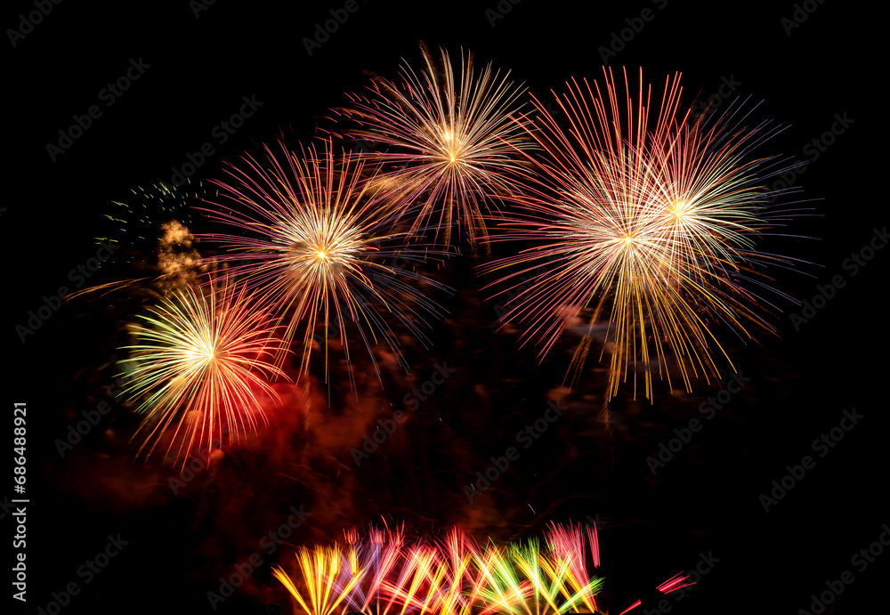 Fireworks show under defocus or blur concepts with isolated black background at night, this celebration is for the International Fireworks Festival in Pattaya on Nov 24-25 in Thailand Fireworks show under defocus or blur concepts with isolated black background at night, this celebration is for the International Fireworks Festival in Pattaya on Nov 24-25 in Thailand