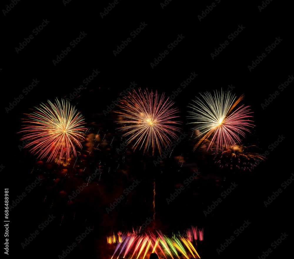 Fireworks show under defocus or blur concepts with isolated black background at night, this celebration is for the International Fireworks Festival in Pattaya on Nov 24-25 in Thailand Fireworks show under defocus or blur concepts with isolated black background at night, this celebration is for the International Fireworks Festival in Pattaya on Nov 24-25 in Thailand