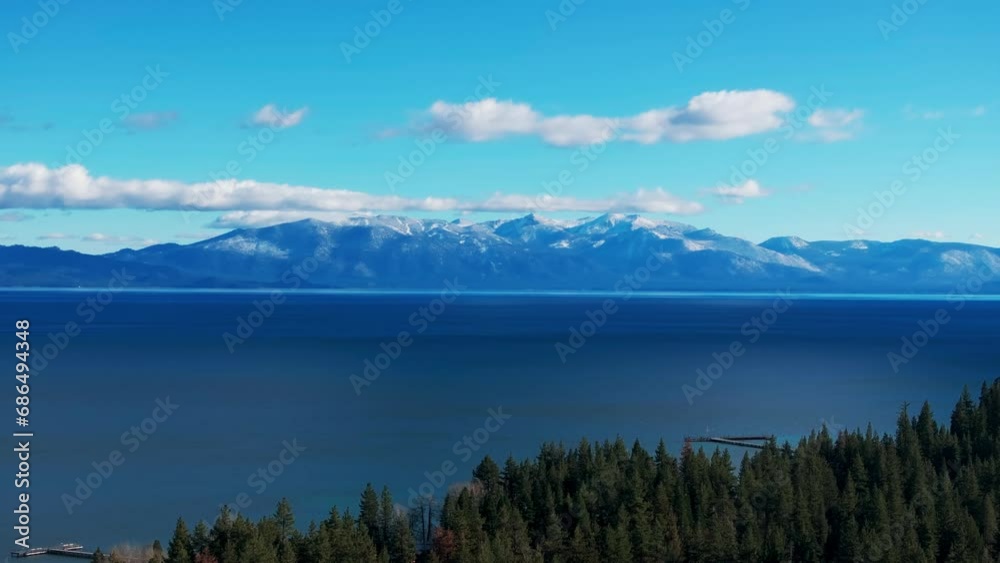 Stationary drone shot overlooking Lake Tahoe on a sunny day Stationary drone shot overlooking Lake Tahoe on a sunny day