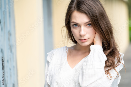 Free Download young woman with long hair in a white dress posing - GFXLoad
