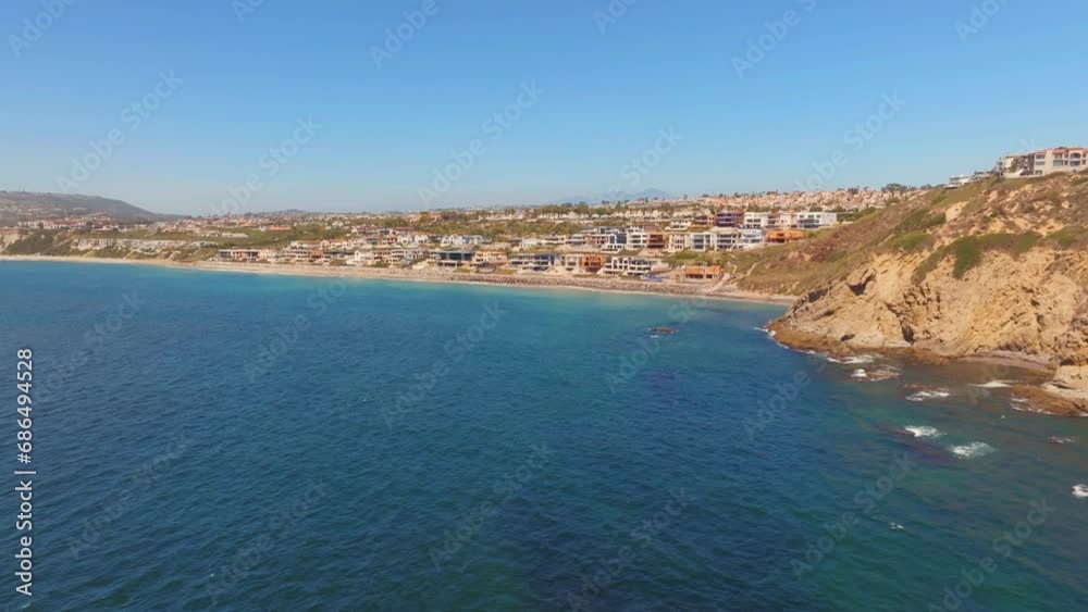 Dana Strands Beach With Beachfront Holiday Homes In Dana Point, California, USA. - aerial shot