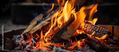 Close up of a stove fire with wood burning
