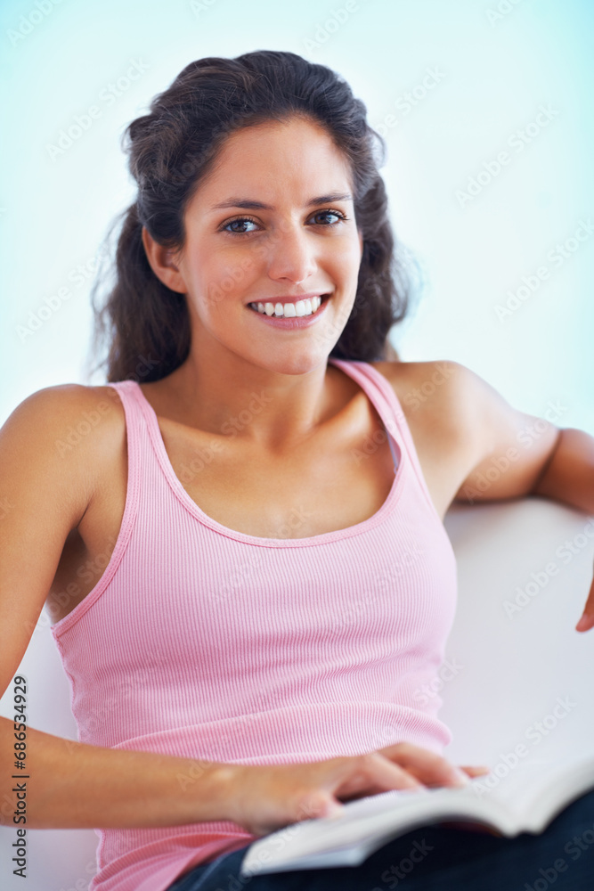 Portrait, relax and happy woman reading books, information or fantasy fiction story, autobiography or creative novel. Wellness, happiness and person free time, hobby and smile for english literature