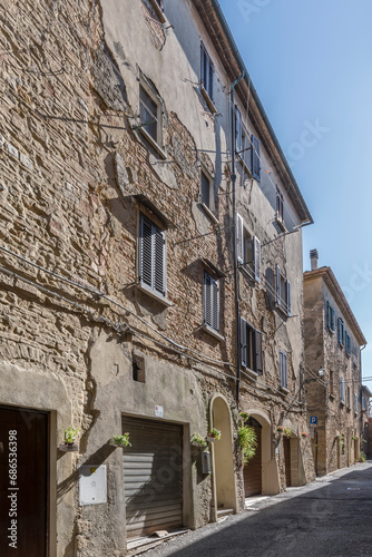 Fototapeta Naklejka Na Ścianę i Meble -  old houses in narrow street, Volterra, Italy