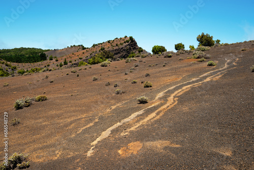 Wonderful volcanic landscape of Hoya de Fireba at El Hierro. Hiking through El Hierro part of the La Llanía Route. Canary Islands, Spain