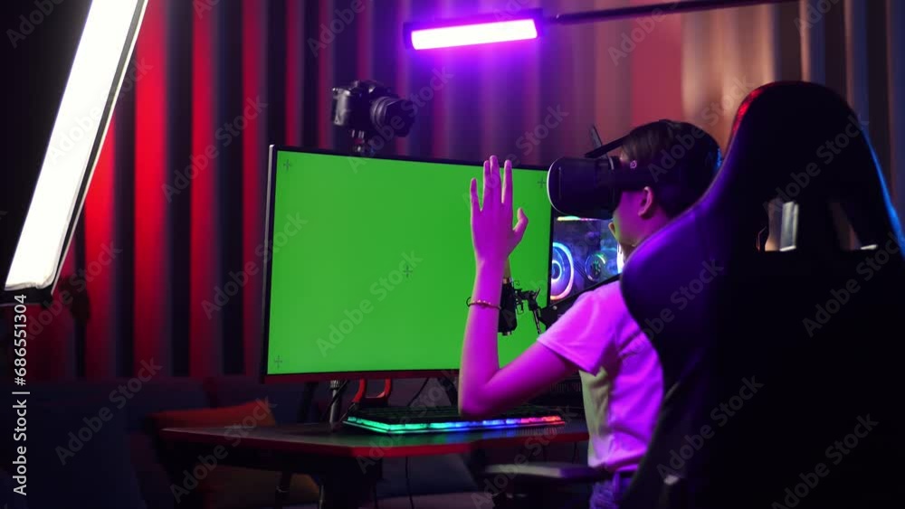 Asian Girl Streamer Playing Game Experience Virtual Reality In Futuristic Goggles
Asian Girl Streamer Playing Game Experience Virtual Reality In Futuristic Goggles