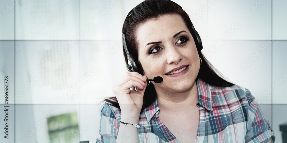 Portrait of young woman working with headset, geometric pattern Portrait of young woman working with headset, geometric pattern