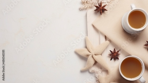 Autumn or winter composition. Gift box Coffee cup, cinnamon sticks, anise stars, beige sweater with knitted blanket on cream color gray fluffy background with generative ai