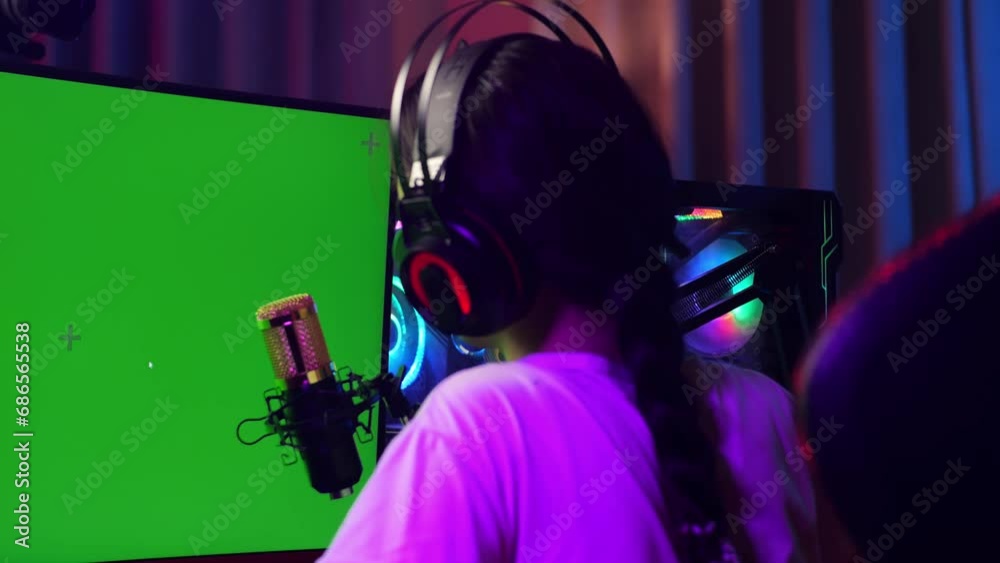 Asian Girl Streamer Using Green Screen Personal Computer, Live Stream Talking
Asian Girl Streamer Using Green Screen Personal Computer, Live Stream Talking
