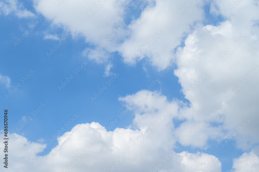 Vibrant colors dance in the sky as sunlight breaks through fluffy clouds. Vibrant colors dance in the sky as sunlight breaks through fluffy clouds.