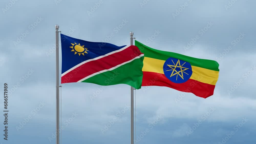 Ethiopia flag and Namibia flag waving together on cloudy sky, endless seamless loop, two country relations concept Ethiopia flag and Namibia flag waving together on cloudy sky, endless seamless loop, two country relations concept