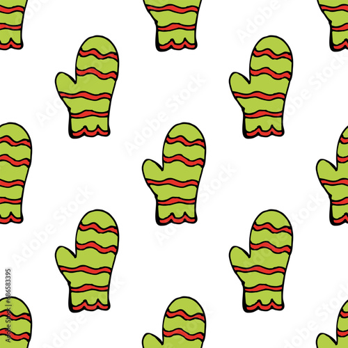 Seamless pattern with green mittens on white background. Vector image.