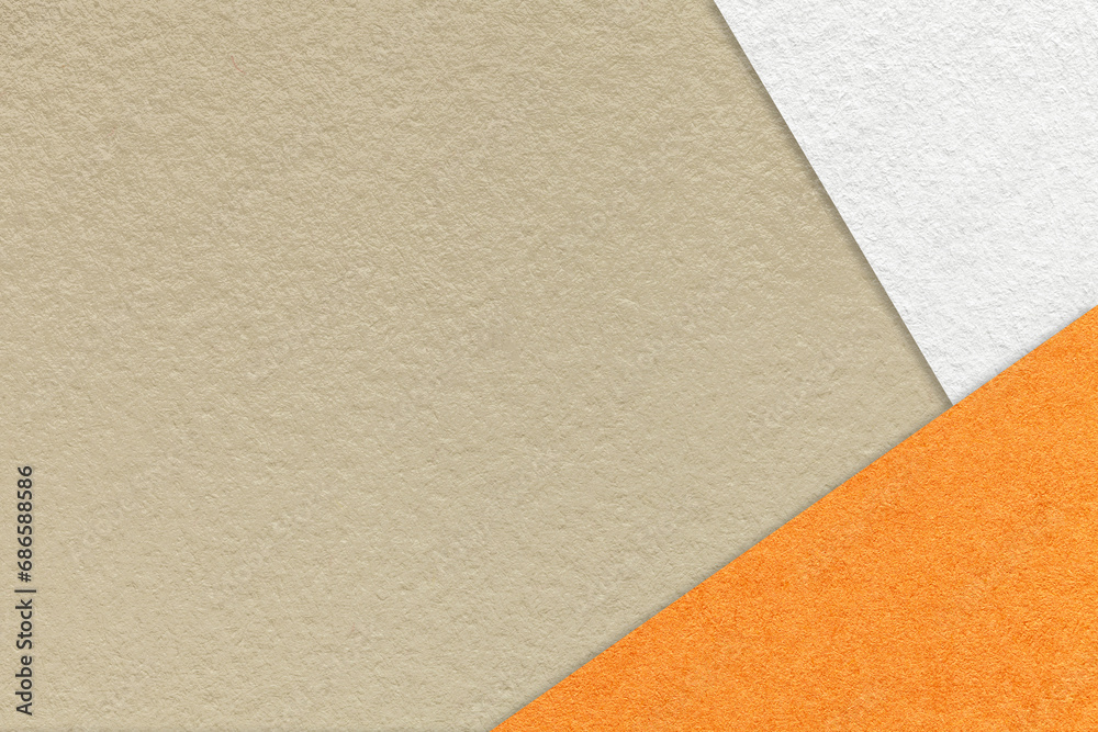 Texture of craft beige color paper background with white and orange border. Vintage abstract sand cardboard. Texture of craft beige color paper background with white and orange border. Vintage abstract sand cardboard.
