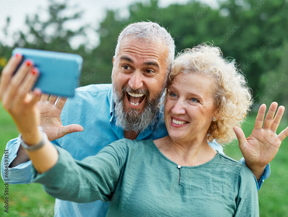 woman man outdoor mature couple selfie together camera photo phone smartphone mobile mid adult cell smiling love old lifestyle wife happiness middle aged nature active vitality woman man outdoor mature couple selfie together camera photo phone smartphone mobile mid adult cell smiling love old lifestyle wife happiness middle aged nature active vitality