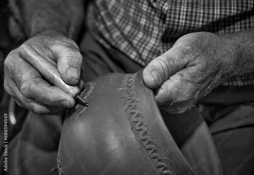 master potter while modeling Vadastra Ceramica clay vessels