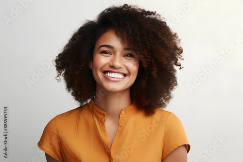 Smiling African Woman on Clean White Background, Confidence, Portrait, Diversity, Ethnicity © asura