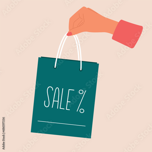 Female hand hold shopping paper or gift bag for sale. Sale sign. Shopping concept for banner. Vector.