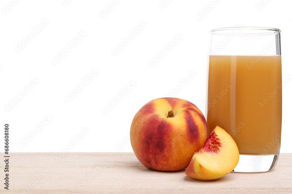 Glass of delicious peach juice and fresh fruit on wooden table against white background Glass of delicious peach juice and fresh fruit on wooden table against white background