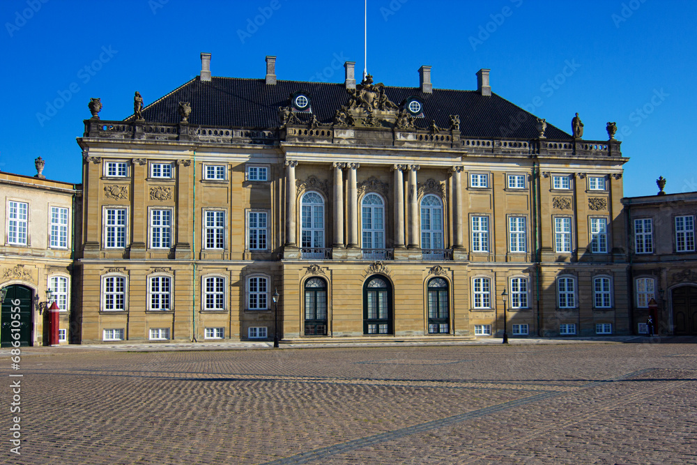 Amalienborg castle is the official residence for the Danish royal family, located in Copenhagen, Denmark. It consists of four identical classical palace facades with rococo interiors	
