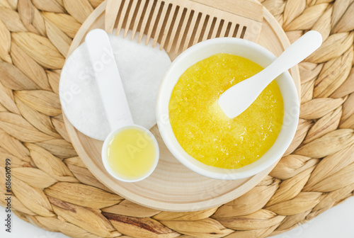 Homemade lemon, honey and sugar scrub for face, foot and body. Natural beauty treatment and spa recipe. Top view.