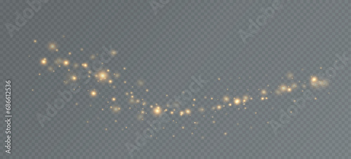 Golden sequins glow with many lights. Glittering dust. Luxurious background of golden particles.	