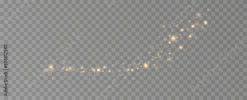 Golden sequins glow with many lights. Glittering dust. Luxurious background of golden particles.	